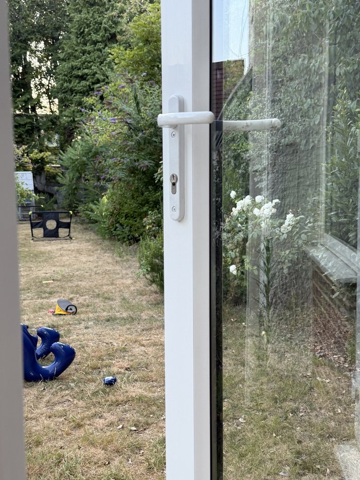 UPVC conservatory door opened onto the garden after a new lock was fitted
