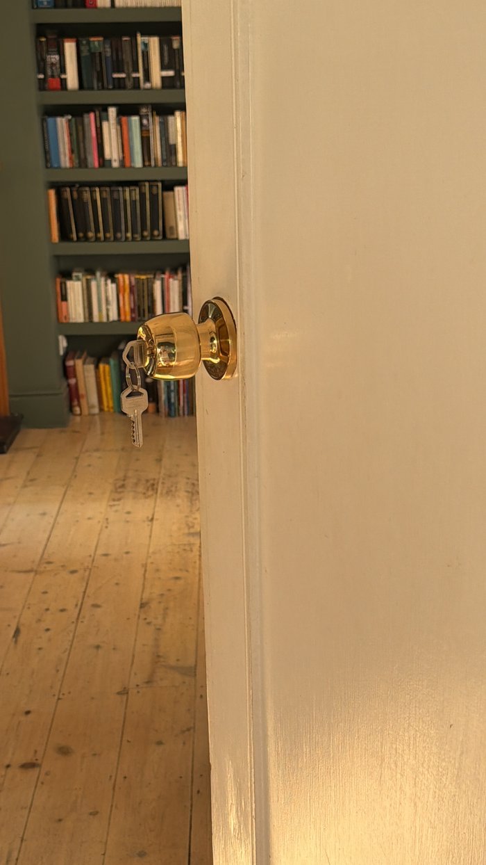 Like-for-like brass door knob after replacement, with new keys fitted and working