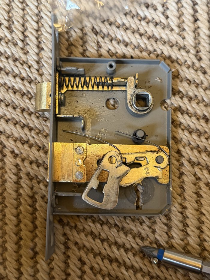 Mortice lock mechanism stripped down for repair rather than full replacement